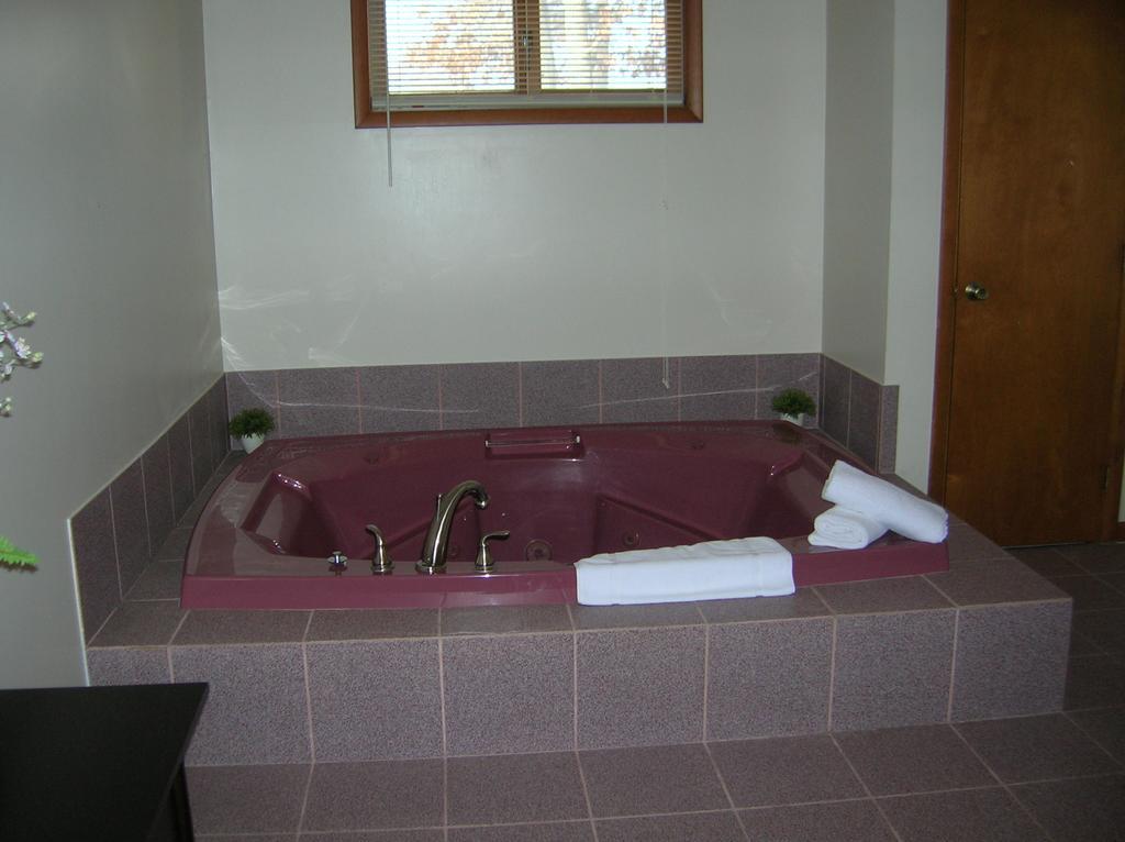 Camp Inn Lodge Oscoda Quarto foto